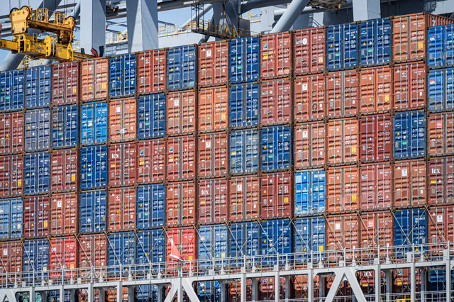 Stacked containers on cargo vessel